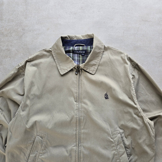 DEEP VINTAGE beige 90s Nautica Harrington jacket with a classic collar and plaid lining