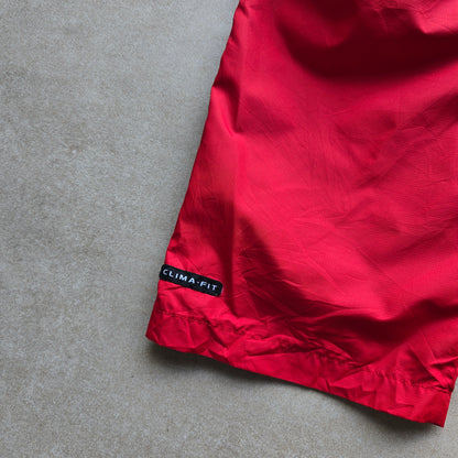 Vintage Nike Embroidered Mini Swoosh Ankle Zip Track Pants - WMNS XS/S