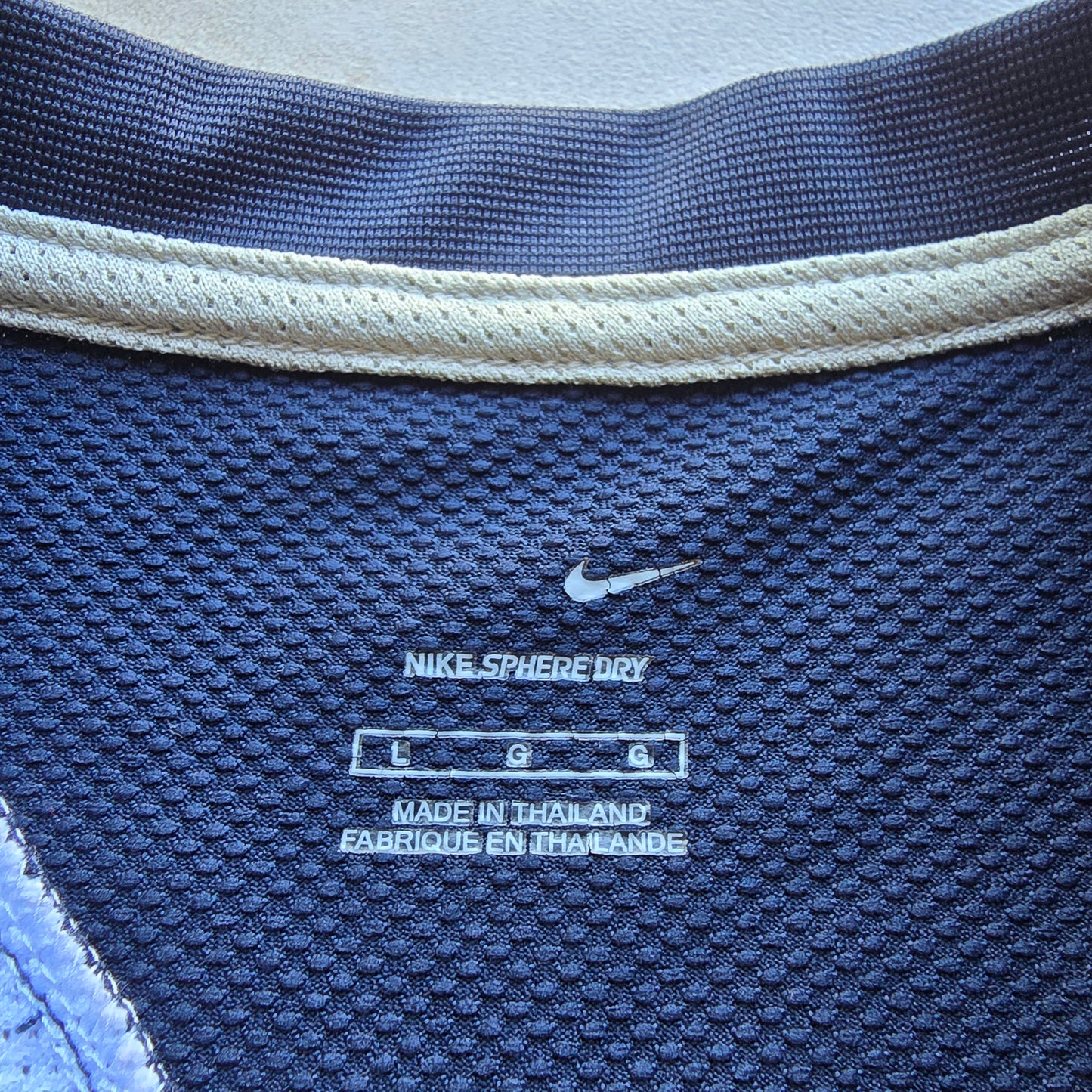 Vintage 2000's Nike Embroidered Mini Swoosh Spheredry Tee - L