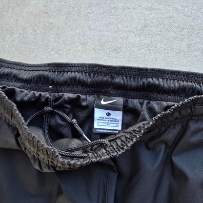 Vintage 2000's Nike Mini Swoosh Ankle Zip Track Pants - L