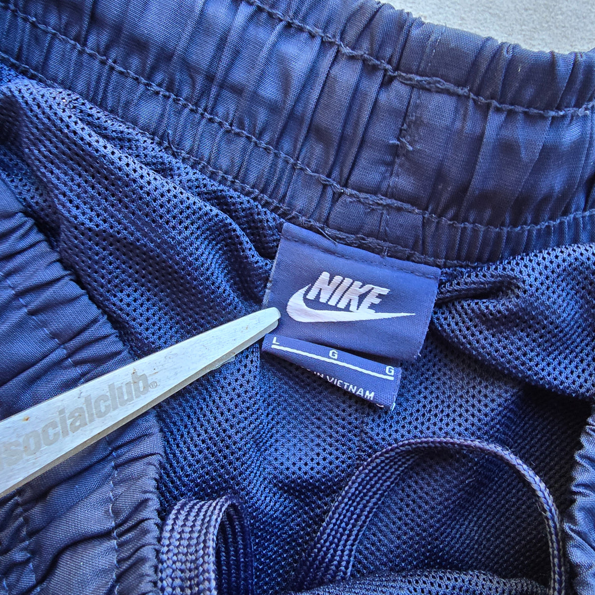 Vintage 2000's Nike Mini Swoosh Track Pants - L