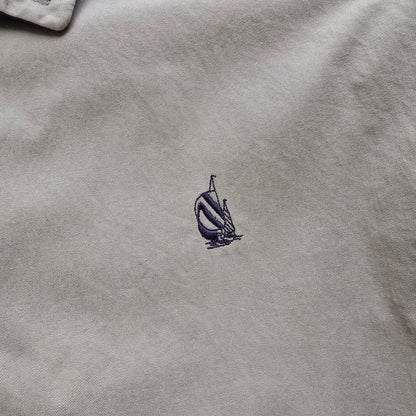 DEEP VINTAGE beige 90s Nautica Harrington jacket featuring a small embroidered navy blue sailboat logo on the chest