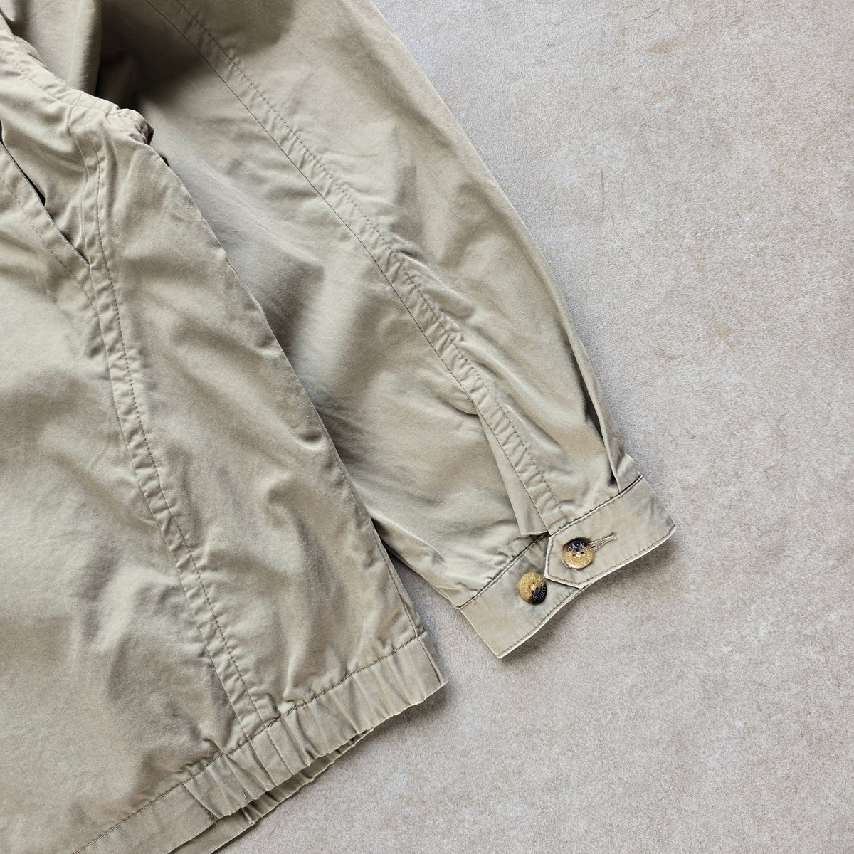 DEEP VINTAGE beige 90s Nautica Harrington jacket sleeve detail with buttoned cuff