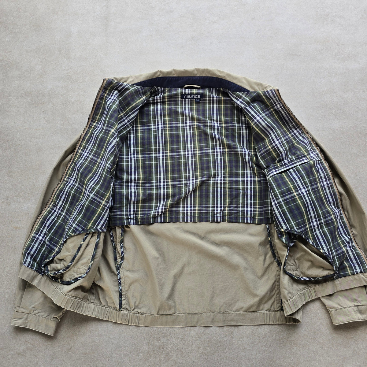 DEEP VINTAGE vintage 90s Nautica Harrington jacket in beige with a green and blue plaid interior lining