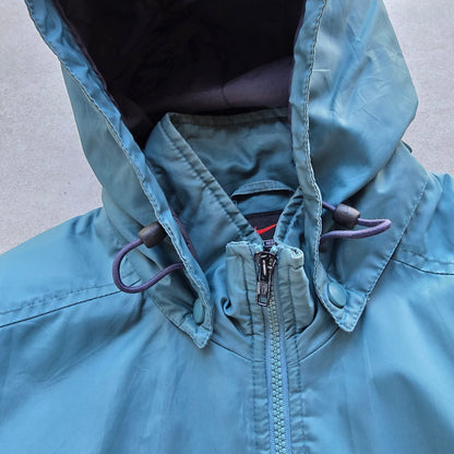 DEEP VINTAGE 90s Nike teal hooded jacket with a zip-up front and adjustable drawstring hood