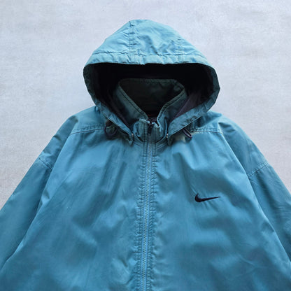 DEEP VINTAGE teal 90s Nike zip-up jacket with a detachable hood and embroidered swoosh logo