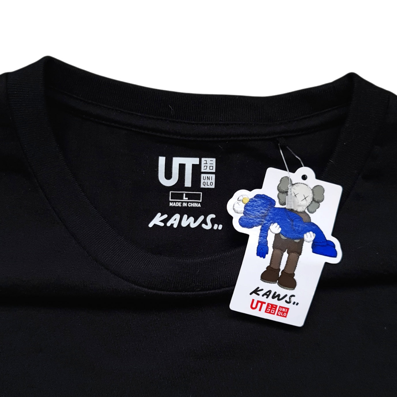 Kaws x Uniqlo Wordmark Tee